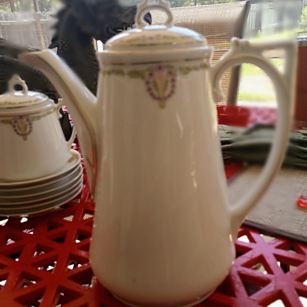CT Altwasser coffee pot, four cups, twelve saucers and cream dispenser.